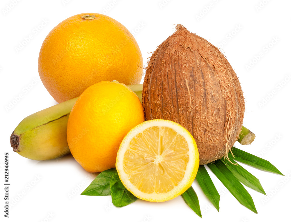 Coconut, lemons and bananas isolated on white background