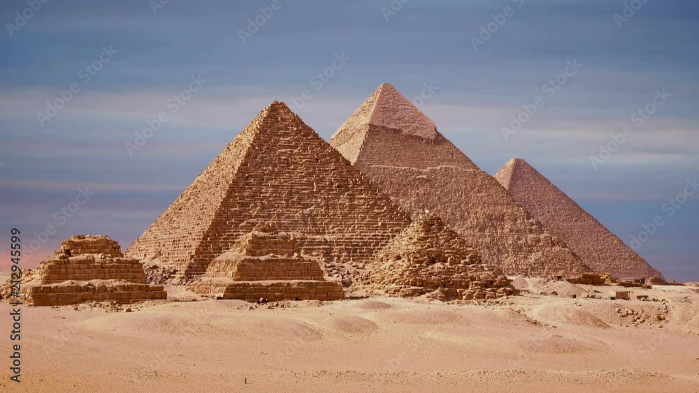 Timelapse Of The Great Pyramids In Giza Valley, Cairo, Egypt. Sunset over the pyramids. Timelapse Of The Great Pyramids In Giza Valley, Cairo, Egypt. Sunset over the pyramids.
