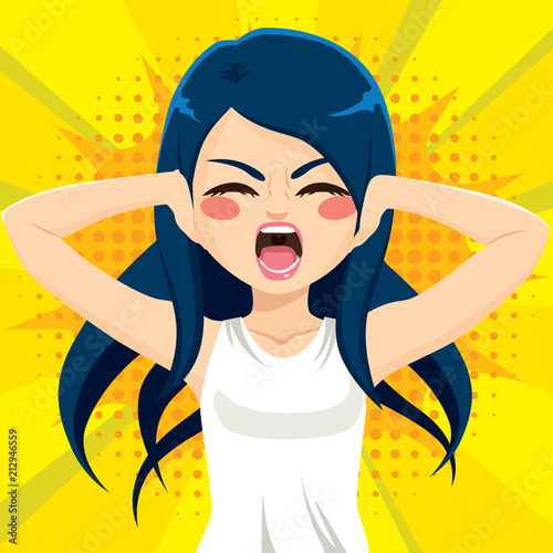 Portrait of dark haired caucasian woman covering ears with hands while screaming
