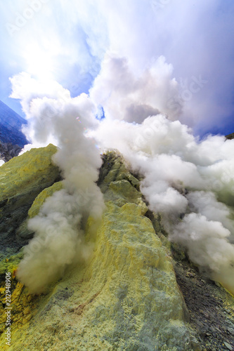 Toxic vappors of sulfur mining, Mount Ijen crater lake, East Java, Indonesia