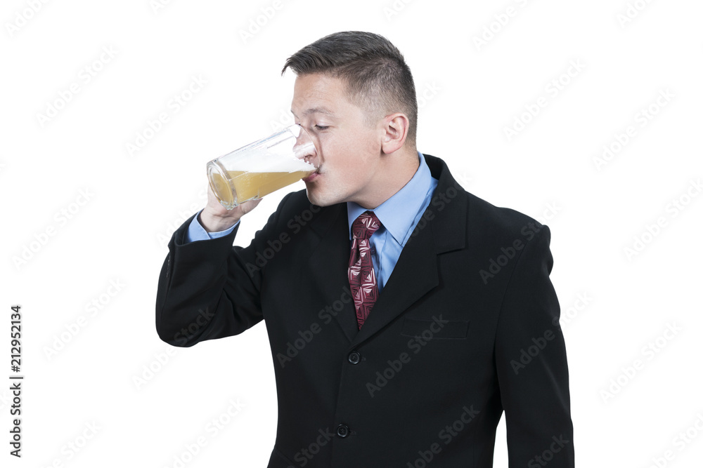 Businessman in suit and tie is drinking beer from mug, isolated on white background Businessman in suit and tie is drinking beer from mug, isolated on white background