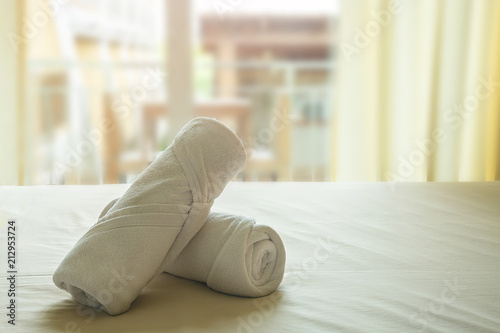 White Towel Roll Cream Rolls On Yellow Cotton Mattresses With Soft Light In Morning.