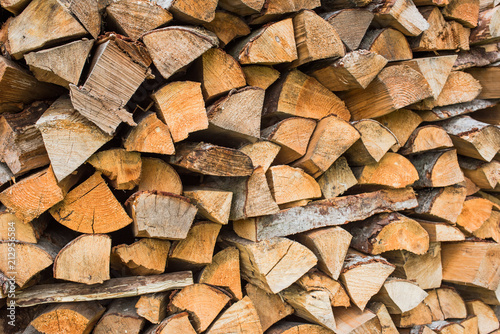 The texture of a large stack of firewood