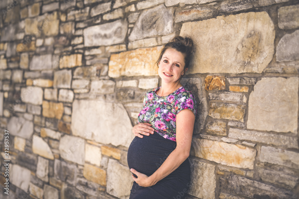 Portrait of a happy and proud pregnant woman on urban background Portrait of a happy and proud pregnant woman on urban background