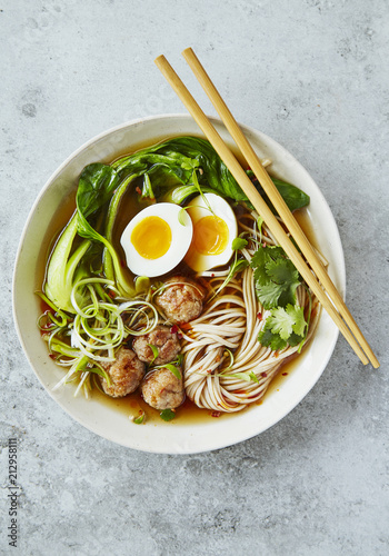 Asian Ramen noodles with egg and pak choi