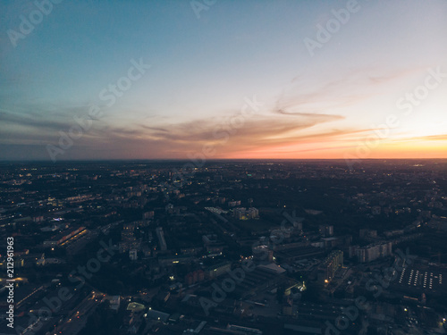 orange clouds with blue sky on sunset. copy space. aerial view