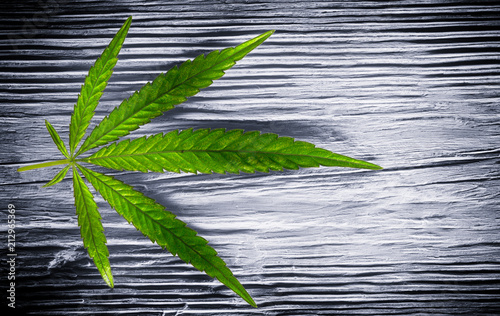 A hemp sheet on a white wooden background