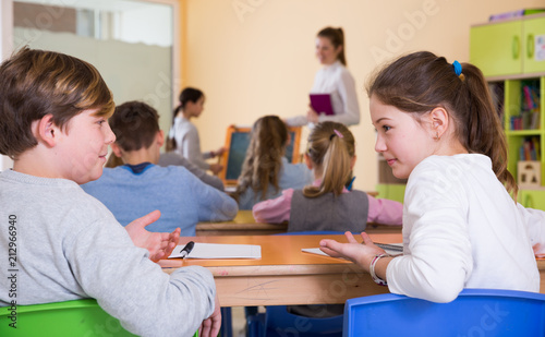 Children discussing during lesson