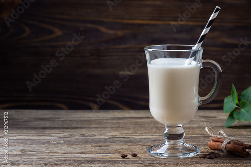 Milk cocktail on wooden table