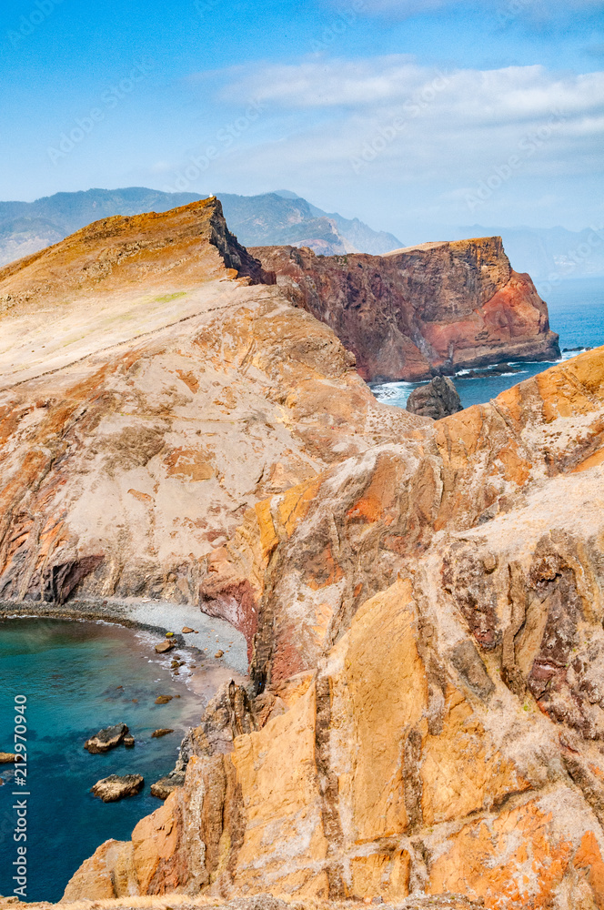 Red cliffs and blue sea at San Lorenzo cape on Madeira island
