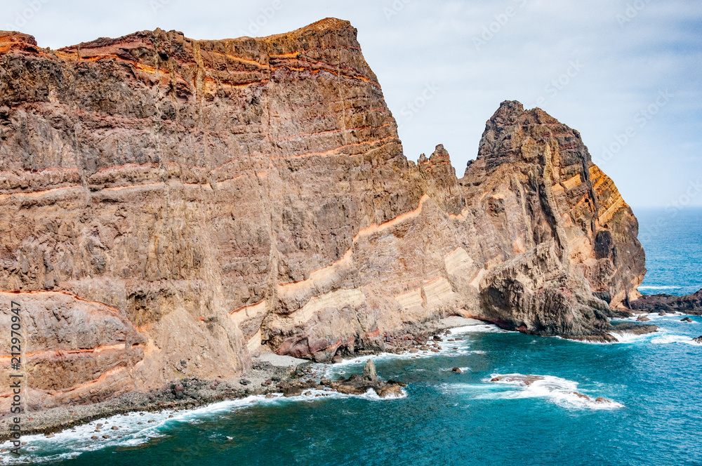 Red cliffs and blue sea at San Lorenzo cape on Madeira island