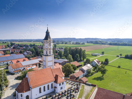 Luftaufnahme Dorf mit Kirchturm im Allgäu photo