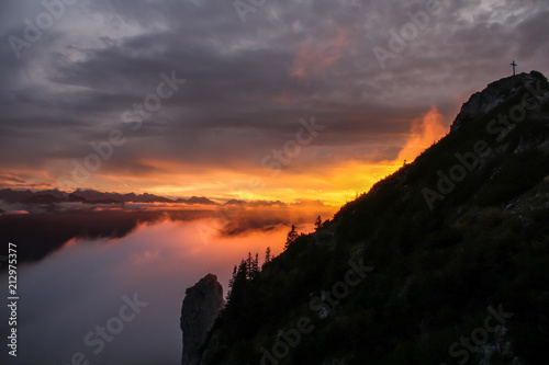 Sunset view with a dramatic sky from the Tegernseer Hütte in Bavaria towards the Zugspitze, in the German Alps
