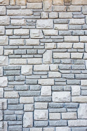 background, wall of different shapes of sharpened stones