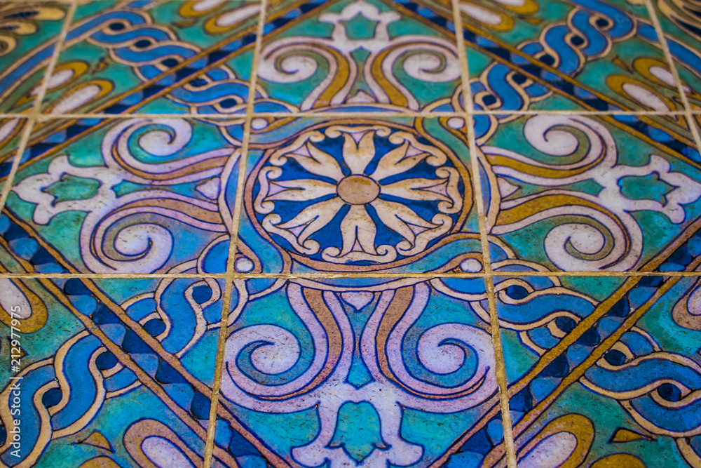 Closeup of Gold, Turquoise, and Blue Tiles in Los Angeles, California, USA