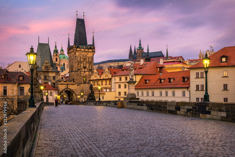 Morning view of Charles Bridge in Prague, Czech Republic. The Charles Bridge is one of the most visited sights in Prague. Architecture and landmark of Prague