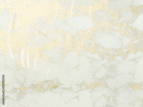 Gold marble background. Shiny, glitter and glossy effect for an elegant wallpaper.