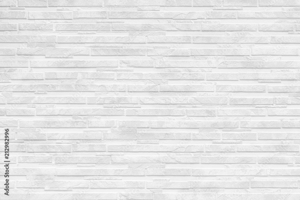 Naklejka premium Modern white stone tile wall pattern and background
