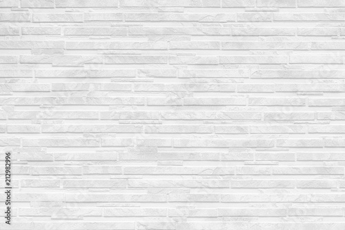 Modern white stone tile wall pattern and background