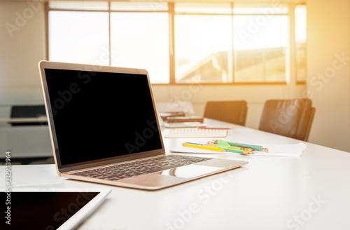 laptop on the table in the meeting room. Fintech and technology photo