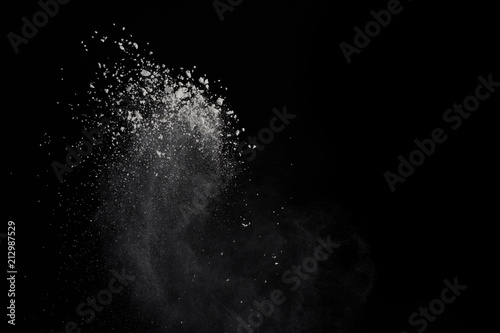 Fotografie, Obraz Explosion of colored powder isolated on black background