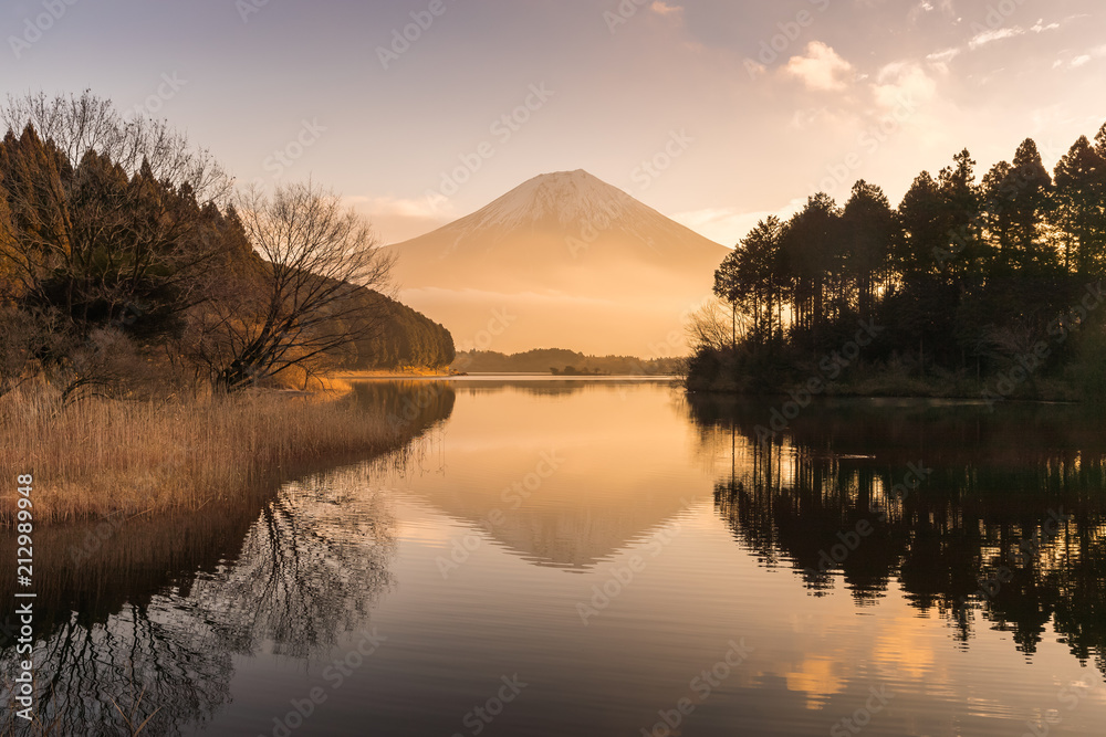 Mountain Fuji and Lake Tanumi with beautiful sunrise in winter season. Lake Tanuki is a lake near Mount Fuji, Japan. 