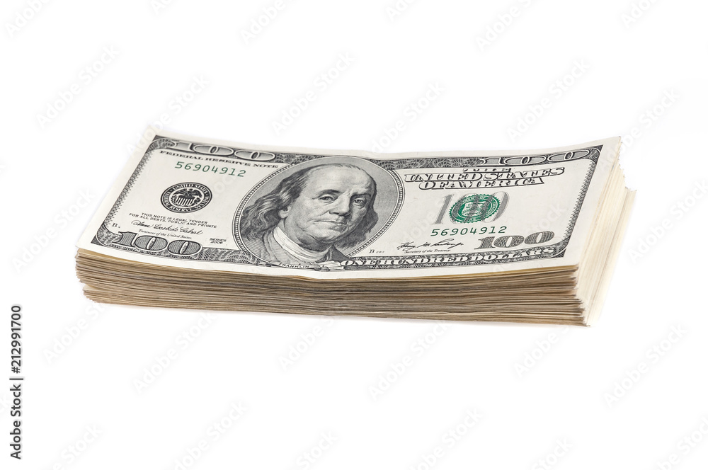 A stack of one hundred dollar bills on a white background. Isolated. A stack of one hundred dollar bills on a white background. Isolated.