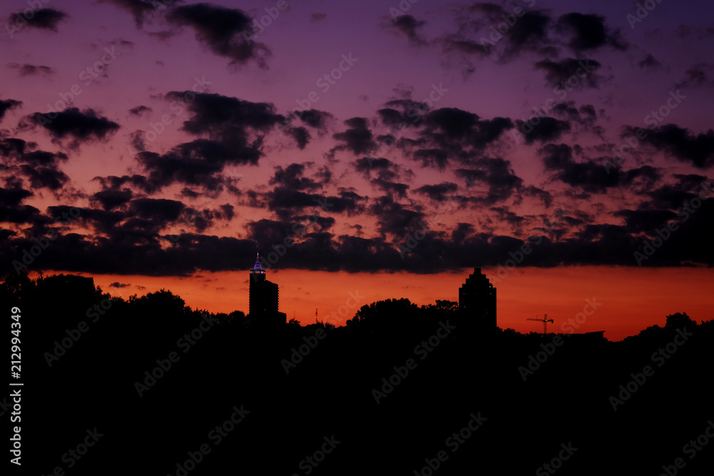 Twilight view of the Raleigh skyline as seen from Dorothea Dix Park