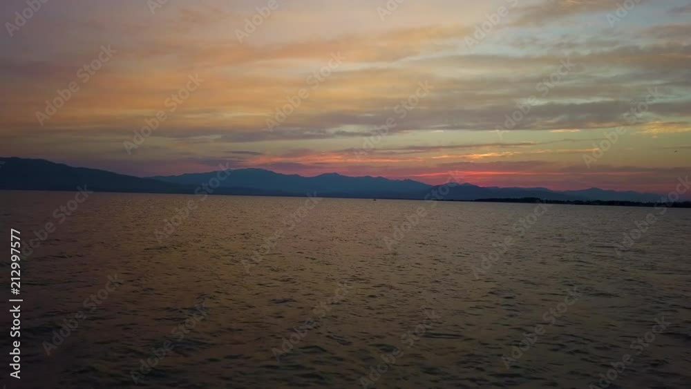 Aerial view of a beautiful vivid sunset at Utah lake, Utah.