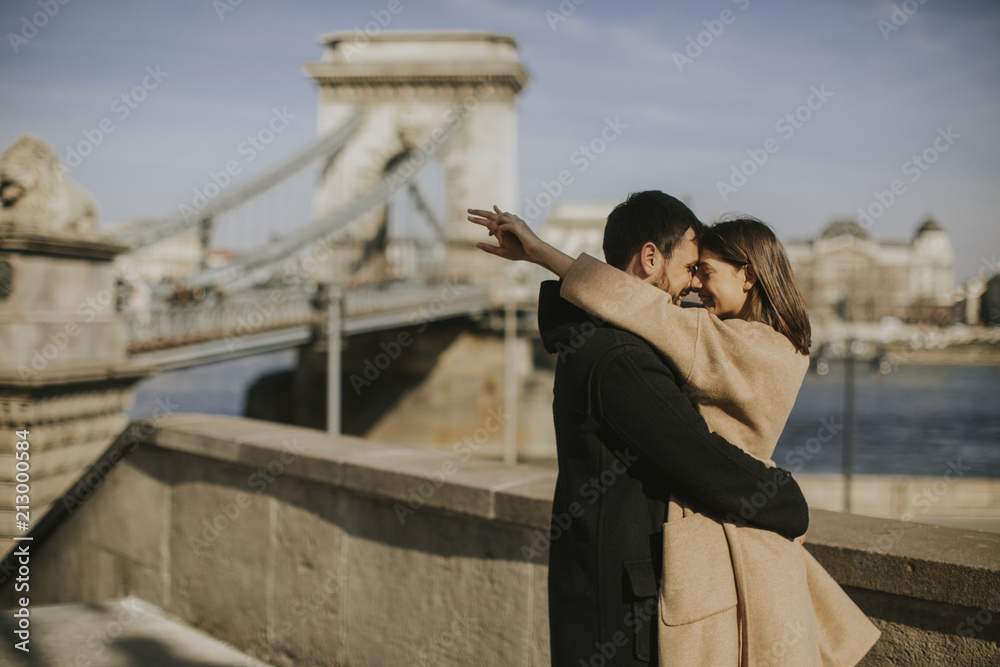 Couple in love hugging with magnificent view of Budapest, Hungary