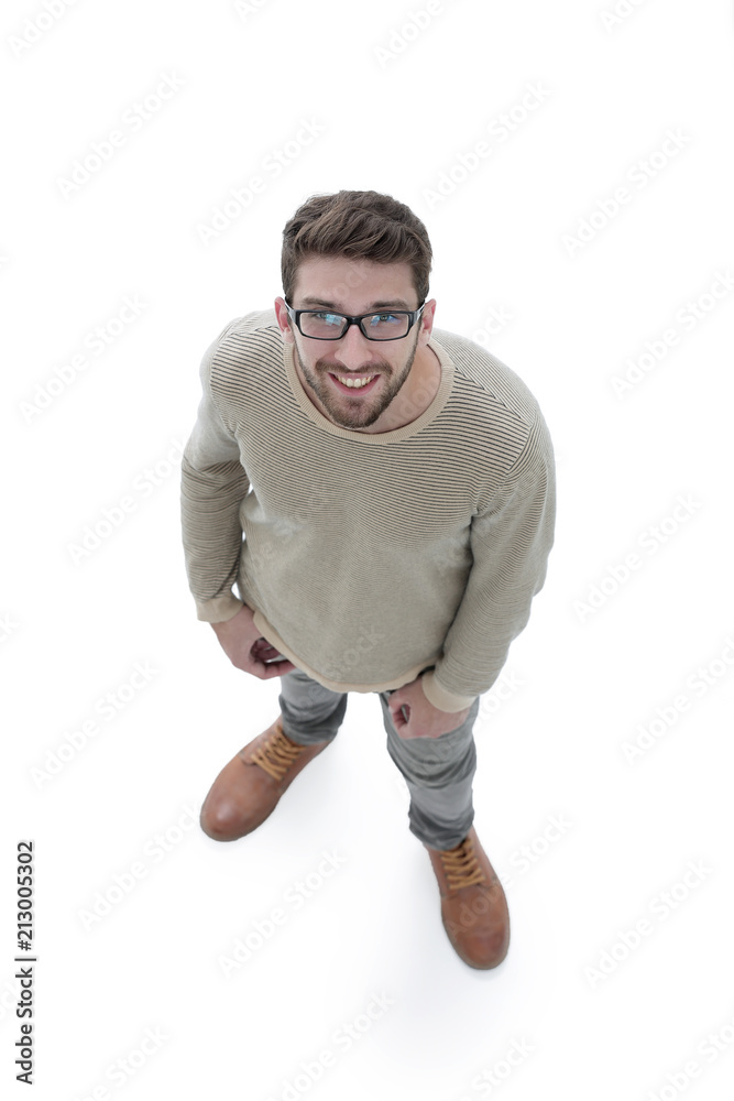 view from above. serious young man looking at camera.