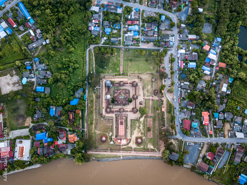 Aerial view of old temple is a buddhist temple in the city of Ayutthaya Province, Thailand, beside Chao Phraya river, aerial view from flying drone, view from green zone. Aerial view of old temple is a buddhist temple in the city of Ayutthaya Province, Thailand, beside Chao Phraya river, aerial view from flying drone, view from green zone.