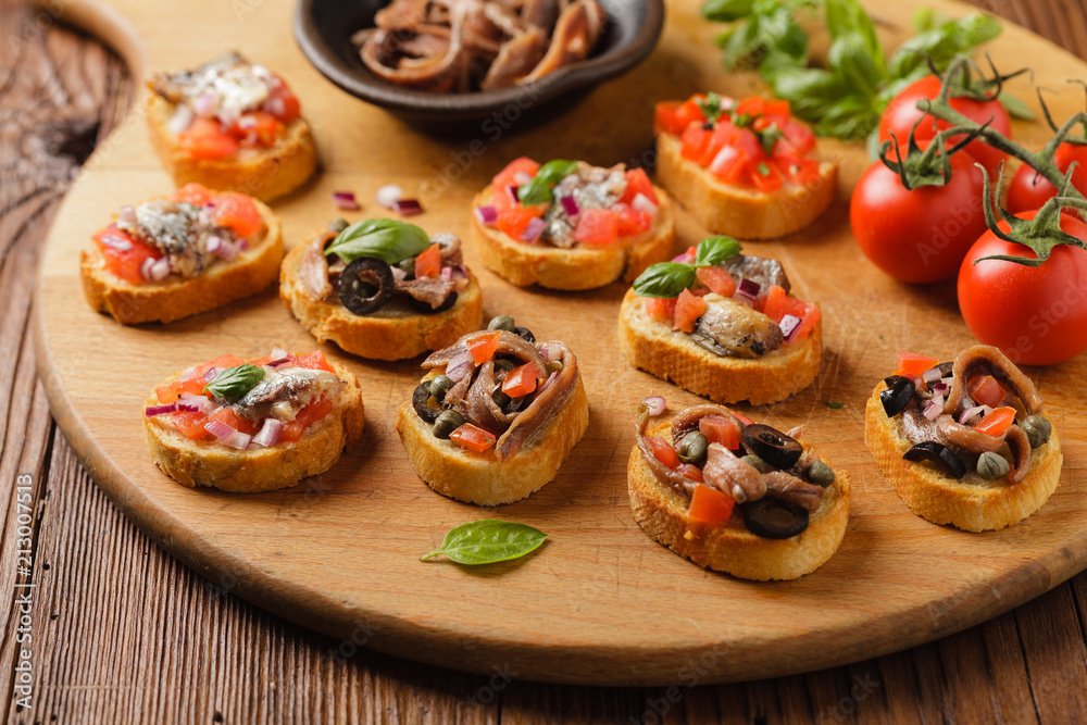 Mix Bruschetta with sardines and anchovies. Mix Bruschetta with sardines and anchovies.