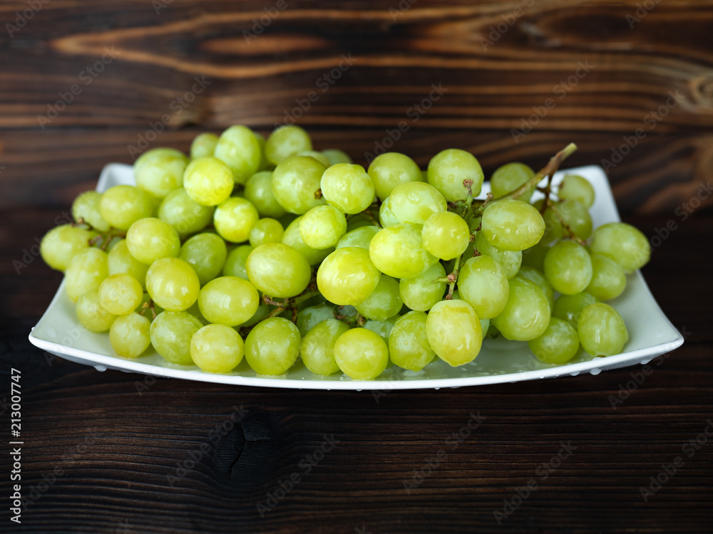 bunch green grapes on wooden background, , food closeup bunch green grapes on wooden background, , food closeup