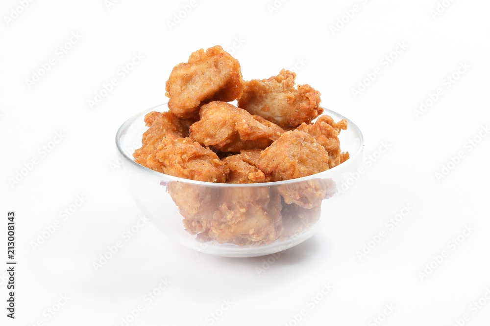 Deep Fried Chicken Wings Drumstick Nuggets Popcorns on white background Deep Fried Chicken Wings Drumstick Nuggets Popcorns on white background