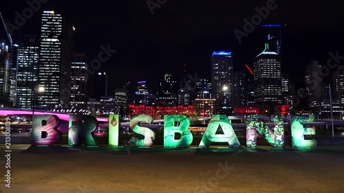 The G20 Brisbane Sign at Night Changing Colour with City Lights in Background