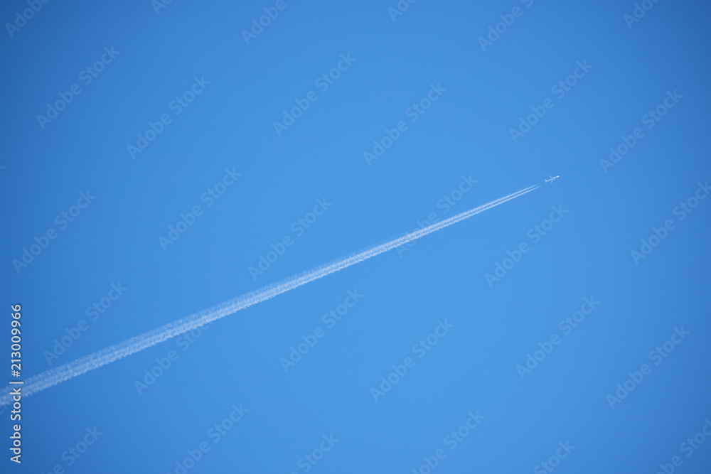 A streak of contrail and blue sky A streak of contrail and blue sky