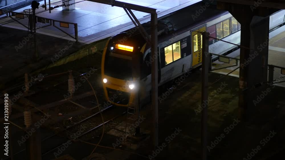 Looking Down on Train Leaving Central Station in Brisbane City at Night Looking Down on Train Leaving Central Station in Brisbane City at Night