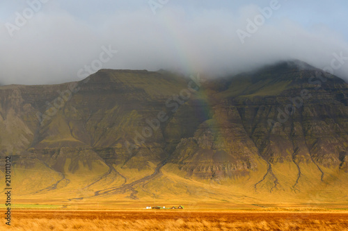 Small farm under the rainbow, Borgarbyggo, Vesturland, Iceland, Europe photo