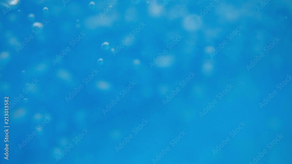 Bubbles rising to the surface. Air bubbles in water in swimming pool (underwater shot), good for backgrounds. Slow motion.
Bubbles rising to the surface. Air bubbles in water in swimming pool (underwater shot), good for backgrounds. Slow motion.