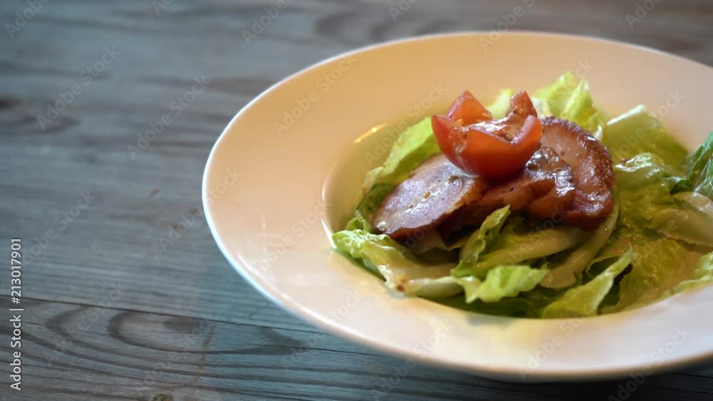 smoked duck salad on table