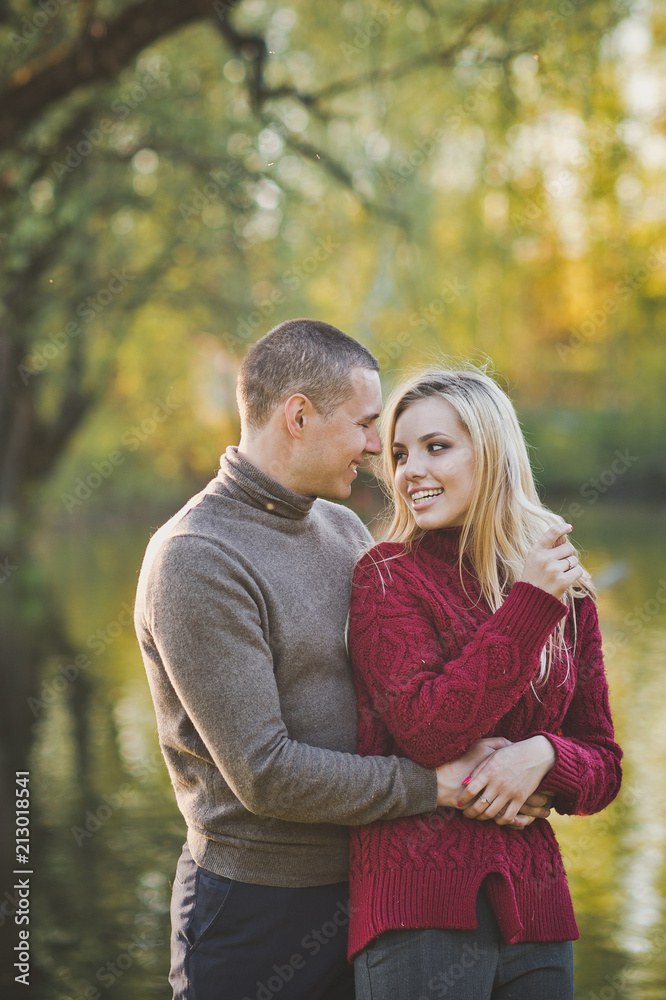 Happy loving couple on a background of water 1425. Happy loving couple on a background of water 1425.