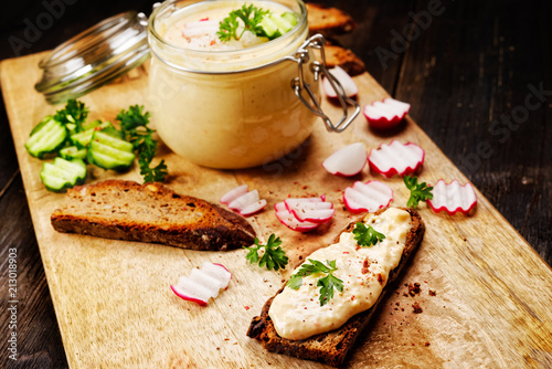 obatzter mit brot und radieschen und gurke photo