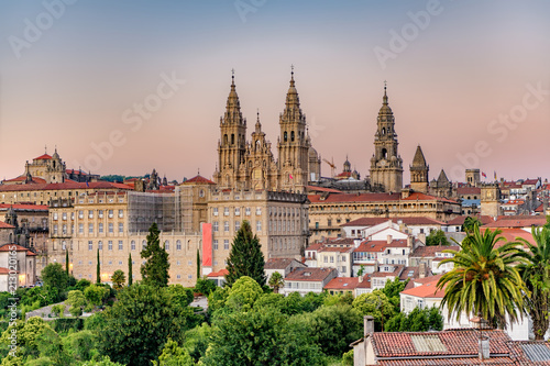 Leinwand Poster Hazy sunset on monumental Santiago de Compostela cathedral.