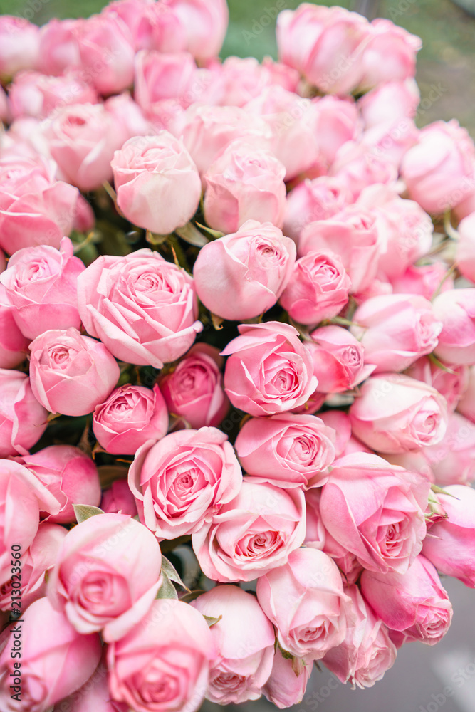 light pink bush roses flowers in vase on wooden table. Beautiful summer bouquet. Arrangement with mix flowers. The concept of a flower shop. Content for the catalog light pink bush roses flowers in vase on wooden table. Beautiful summer bouquet. Arrangement with mix flowers. The concept of a flower shop. Content for the catalog