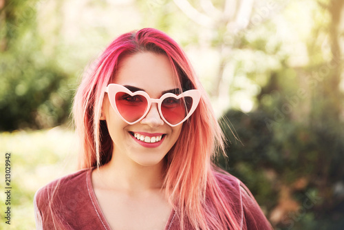 Young woman wearing sunglasses in nature