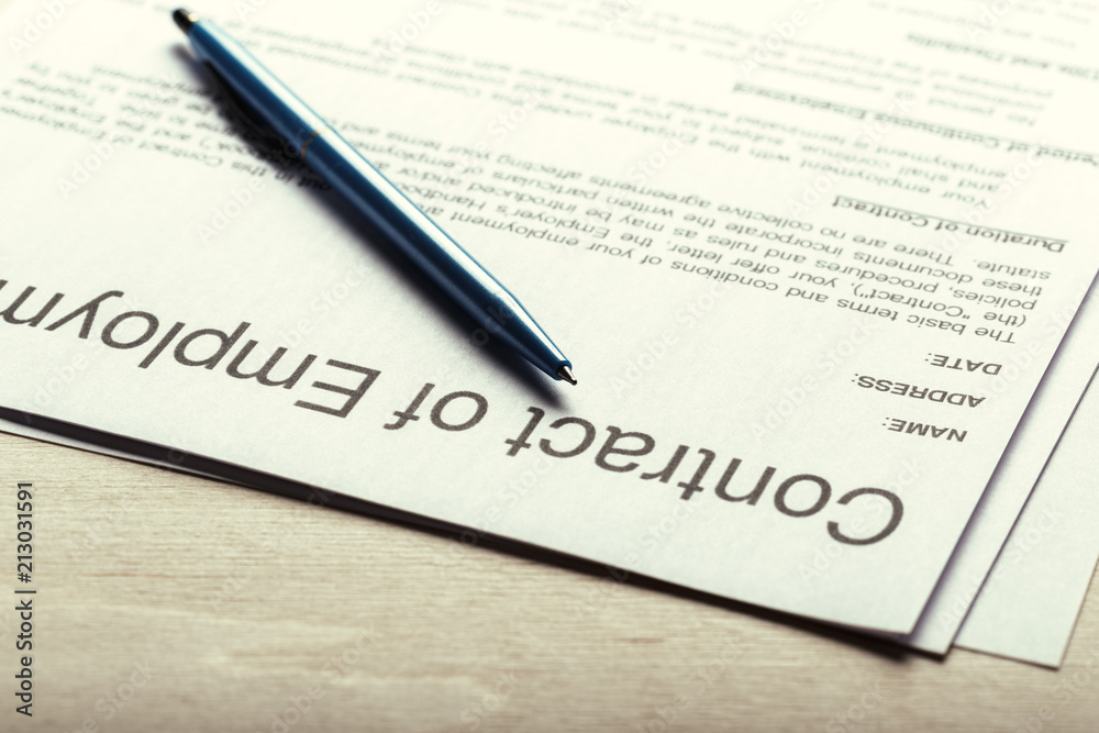 Close up shot of Eyeglasses on contract document papers business concept Close up shot of Eyeglasses on contract document papers business concept