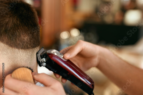 Men Hair Cut In Barber Shop Close Up