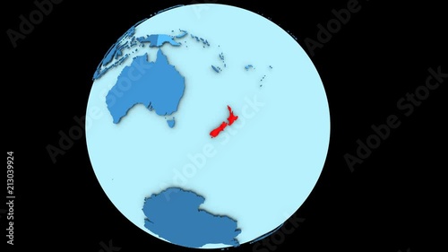 New Zealand in red color on slowly rotating blue political globe. 3D animation.