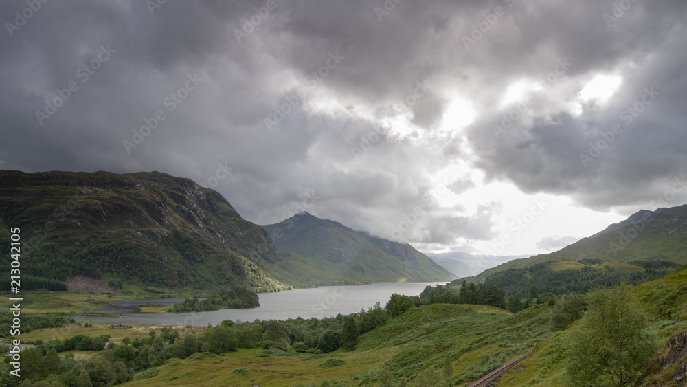 Late summer view of Glenfinnan Monument - commerating Bonnie Prince Charlies landing point in 1745 and the start of the Jacobite Rebellion, near Fort William, Scotland